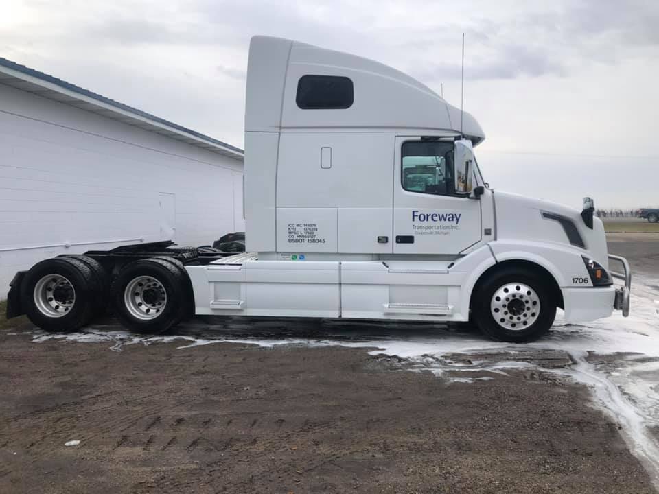 clean truck cab with fleet washing service in grand rapids mi