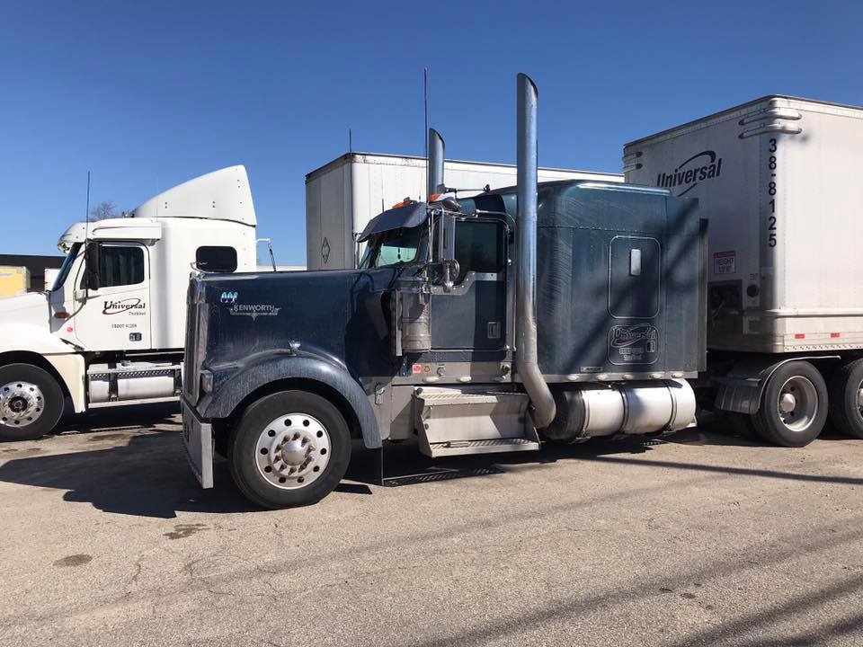 dirty semi truck with blue cab