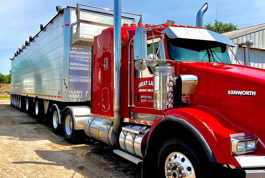 red kenworth semi truck cleaned by fleet cleaner of grand rapids, mi